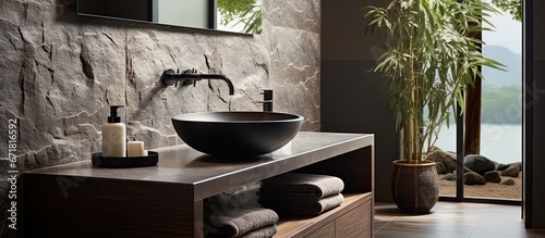 The bathroom contains a basin for washing and a mirror © AkuAku