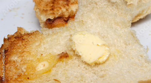 bread with butbread and butter. bread and butter details. melted butter on bread. bread texture.ter.