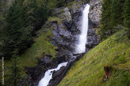 beautiful long exposure waterfalls in the italian dolomites