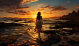 Woman Standing in Serene Ocean Waters at Beautiful Sunset