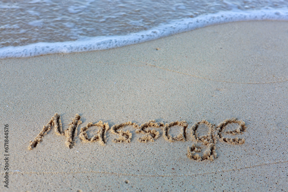 Fototapeta premium Word massage handwritten on the caribbean sand.
