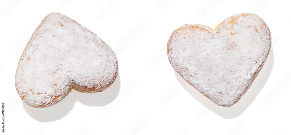 Obraz premium Heart shaped donut with glaze on white background