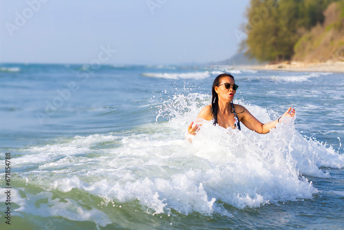 Woman body big with swimsuit relax at beach