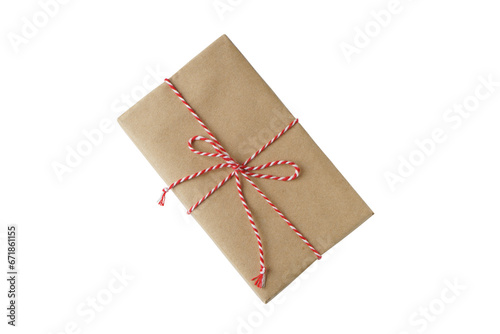 Photography Christmas and New Year gift box wrapped in brown craft kraft paper with red and