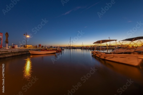 Picture over the harbor of Fazana in Istria in the evening during sunset