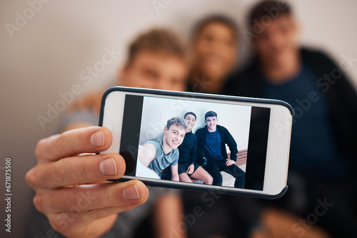Phone, selfie and friends together after exercise feeling relax with a smile and mobile connection. Profile picture, social media and networking app of a man hand holding cellphone for group photo