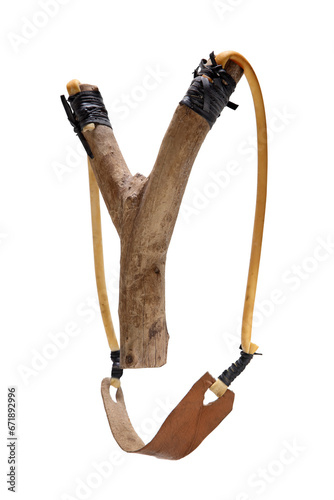 handmade wooden slingshot on cut out background photo