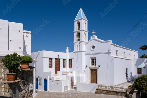 A traditional whitewashed church in Volax, Tinos, Greece photo