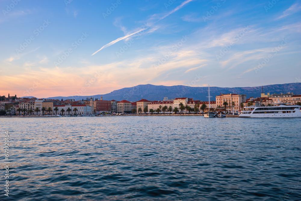 Waterfront view of Riva promenade in Split at sunset. Croatia