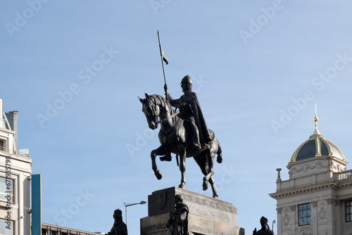 Silhouette view of Statue of Saint Wenceslas on Wenceslas Square, Prague. Bronze equestrian statue of knight in armor photo