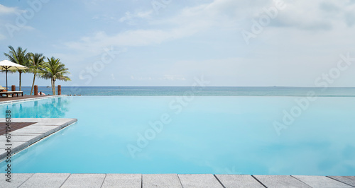 summer vacation, clear swimming pool at the resort