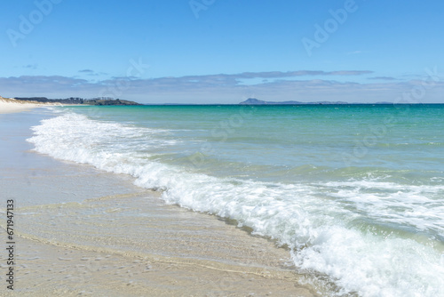 Puheke Beach Landscape with Crystal Clear Waters and White Sandy Shores of Karikari Peninsula, Northland, New Zealand photo