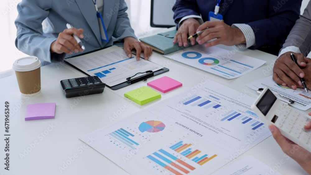 Team of creative businesspeople plan strategic analysis and brainstorm with financial reports, tax documents, calculations, analyze marketing processes with laptops in the office. Team of creative businesspeople plan strategic analysis and brainstorm with financial reports, tax documents, calculations, analyze marketing processes with laptops in the office.