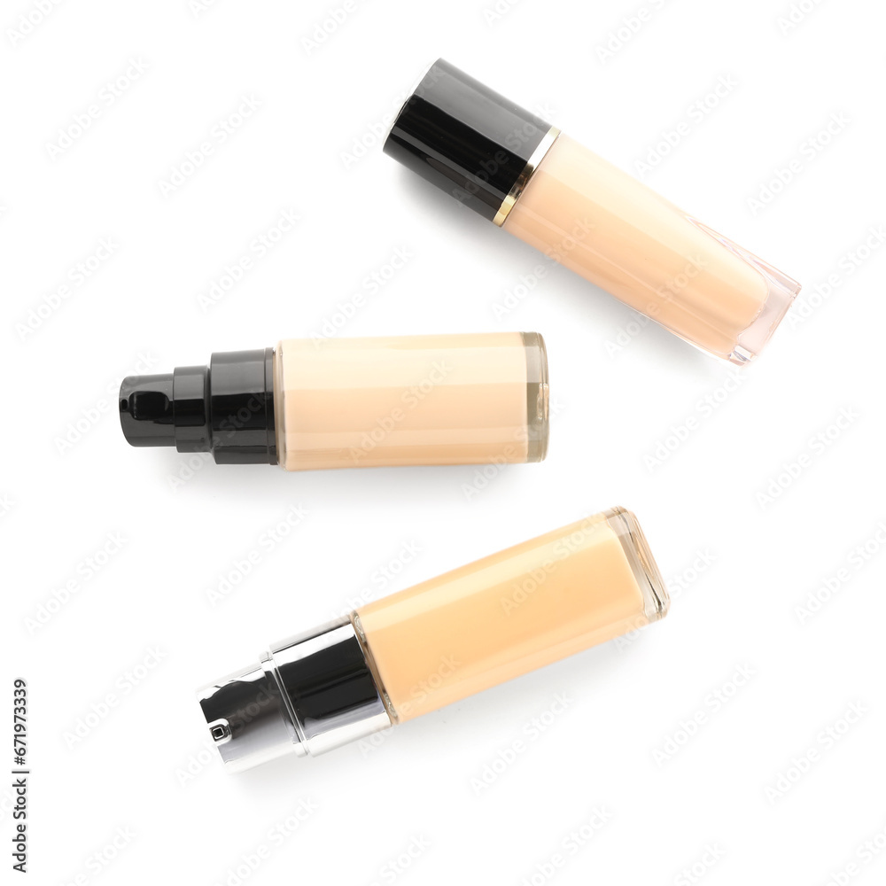 Bottles of makeup foundation isolated on white background Bottles of makeup foundation isolated on white background