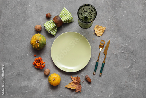 Beautiful table setting for Thanksgiving Day celebration on grey background