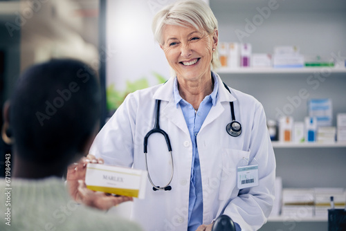 Happy woman, pharmacist and medicine box for patient, pills or prescription over the counter at pharmacy. Female person, medical or healthcare professional giving pharmaceutical product to customer