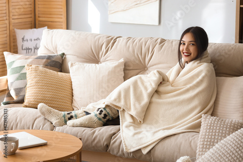 Young Asian woman with plai...