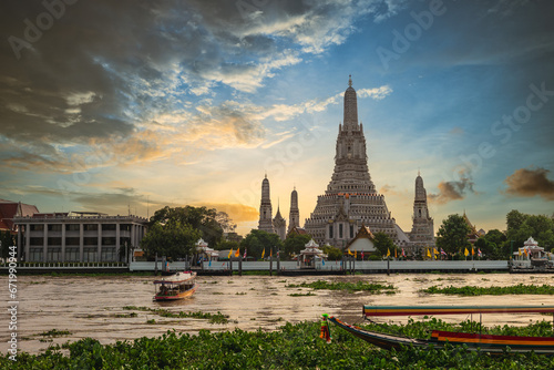 Wat Arun at the bank of Chao Phraya River in Bangkok, thailand