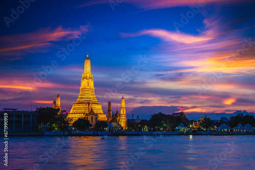 Wat Arun by Chao Phraya River in Bangkok, thailand at night