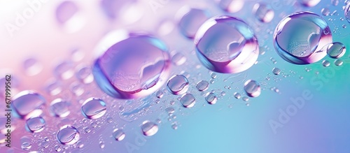 An abstract portrayal of nature s background featuring soap bubbles in various colors such as purple blue and green captured in a close up macro perspective The focus is predominantly on th