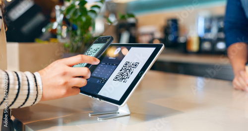 Hands, phone and qr code in coffee shop, payment and fintech app with pos, deal and services with scanning in store. People, smartphone and machine for point of sale, banking and barcode in cafeteria photo