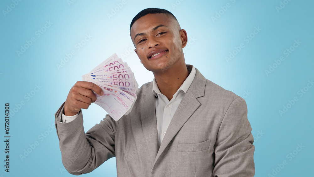 Business man, winning and money fan for success, bonus and lottery prize, stock market profit or cashback in studio. Portrait of winner or trader cash and financial achievement on a blue background Business man, winning and money fan for success, bonus and lottery prize, stock market profit or cashback in studio. Portrait of winner or trader cash and financial achievement on a blue background