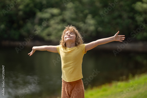 Kid dreams on future. Carefree kid dreaming outdoor. Childhood dream concept. Blonde cute daydreamer child dream on fly. Dreams and imagination. Creative kid. Funny little kid face.