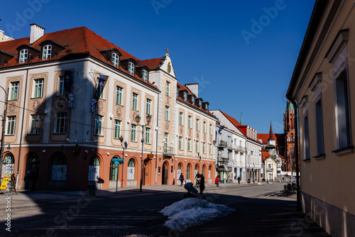 A beautiful square with historical buildings on a sunny day. Kosciuszko Market Square in Bialystok, Poland, March 3, 2021