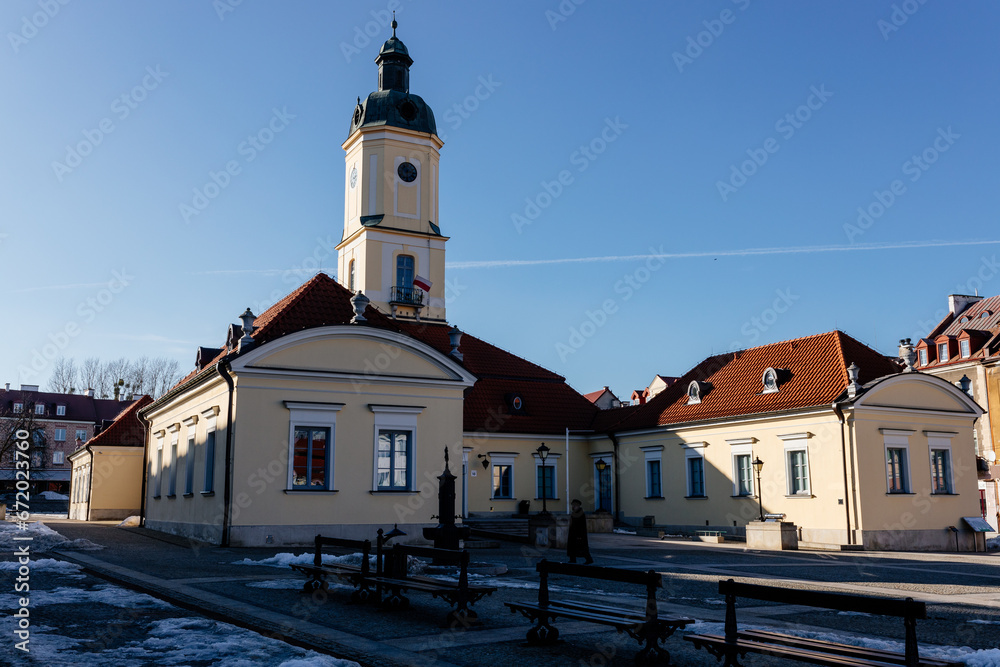 A beautiful square with historical buildings on a sunny day. Kosciuszko Market Square in Bialystok, Poland, March 3, 2021