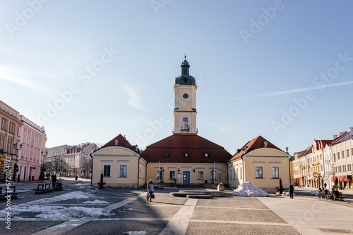 A beautiful square with historical buildings on a sunny day. Kosciuszko Market Square in Bialystok, Poland, March 3, 2021 photo
