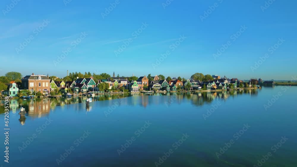 Beautifully built houses along the river at the Zaanse Schans, Koog aan de Zaan, Netherlands.