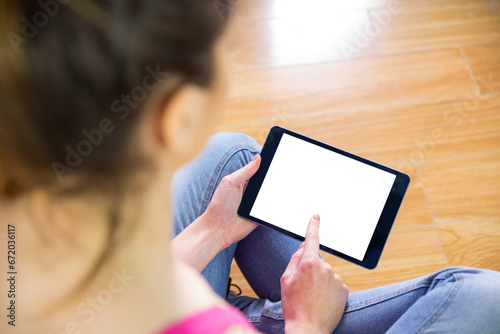 Digital png photo of caucasian woman using tablet on transparent background