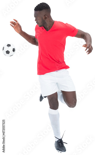 Fototapeta Naklejka Na Ścianę i Meble -  Digital png photo of african american man playing football on transparent background
