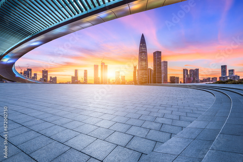City square and skyline with modern buildings in Shenzhen at sunset, Guangdong Province, China. photo