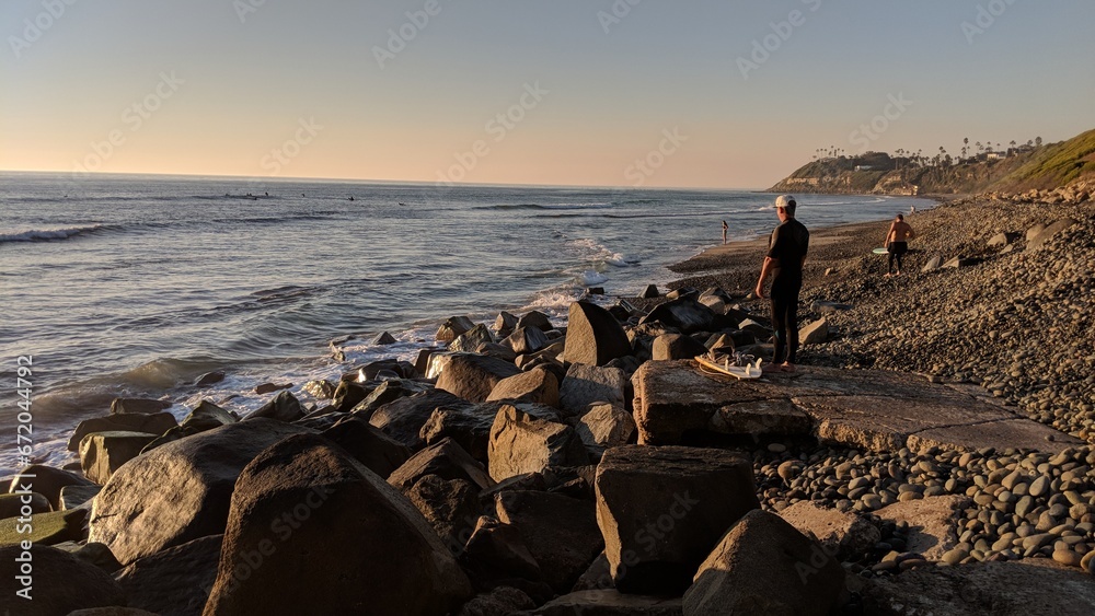 Southern California beach scenes with sunsets, surfers, tide pools and palms trees at Swamis Reef Surf Park and Moonlight Beach in Encinitas California.