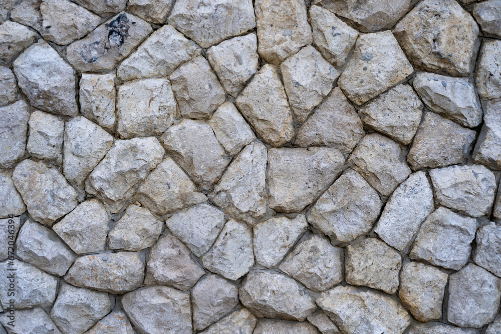 Stone Wall Texture, Natural stone granite wall. Seamless Texture Stone Wall. Texture of old stone brick wall in city, decorative uneven cracked real stone wall surface with cement Stone Wall Texture, Natural stone granite wall. Seamless Texture Stone Wall. Texture of old stone brick wall in city, decorative uneven cracked real stone wall surface with cement