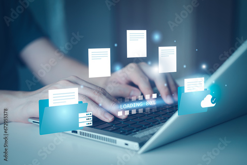 Hand typing on laptop for send a document from on-premise to cloud on internet. Data transfer, Exchange or Transfer files between folder, Backup data, DMS. Virtual document loading to another folder.