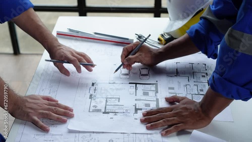 Structural engineering team discusses and calculates office interior design work, house structure concepts, construction, house models, concept meetings, business objects, real estate. photo