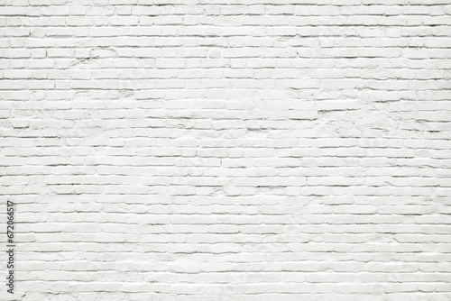 White brick wall. Old grunge white painted brick wall texture background. Loft style wall. White brick background for photos, fabrics, textiles, papers