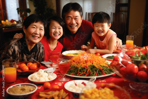 happy Chinese family at a festive New Year s table. Chinese New Year