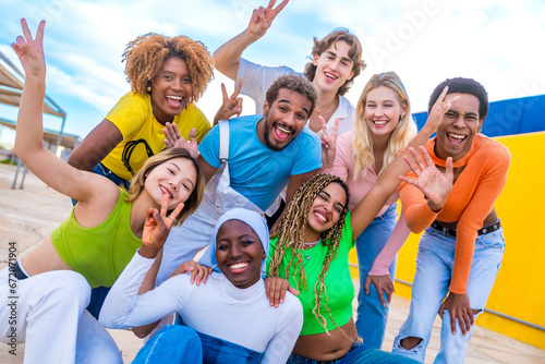 Young people posing outdoors and smiling together