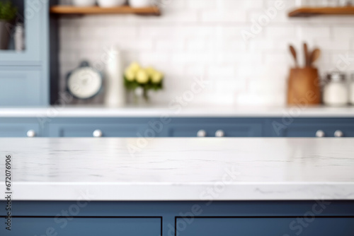 Empty white marble counter top in modern kitchen blue color with blurred background. High quality photo