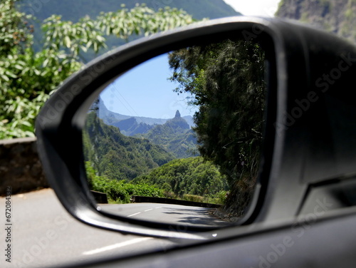 Epic roadtrip in Cilaos circus, view  of mountains in the wing mirror photo