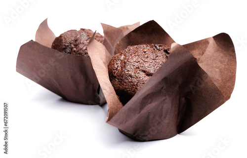 Two chocolate muffins isolated on a white background . Muffin with chocolate chips.
