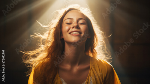 Attractive happy young woman flying hair enjoying her free time at sunset. Beauty blonde girl portrait at summer. Sun glow on background