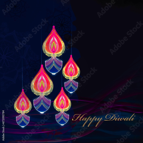 Happy Diwali greetings Artwork in various bright colours and diya lamp in shaded background