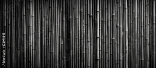 A wall texture made in the traditional Thai style using bamboo that can be used as a background with tones of black and white
