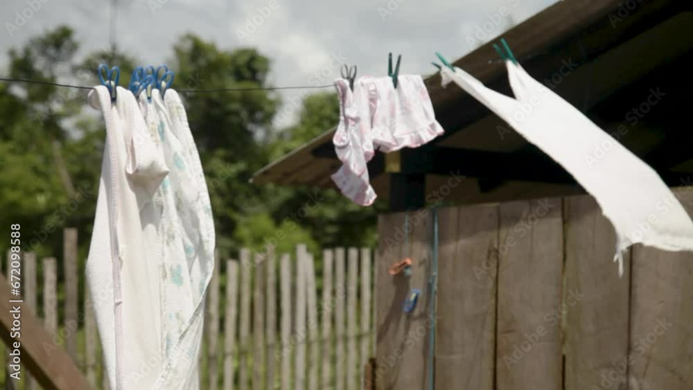 White clothes hanging on the clothesline White clothes hanging on the clothesline