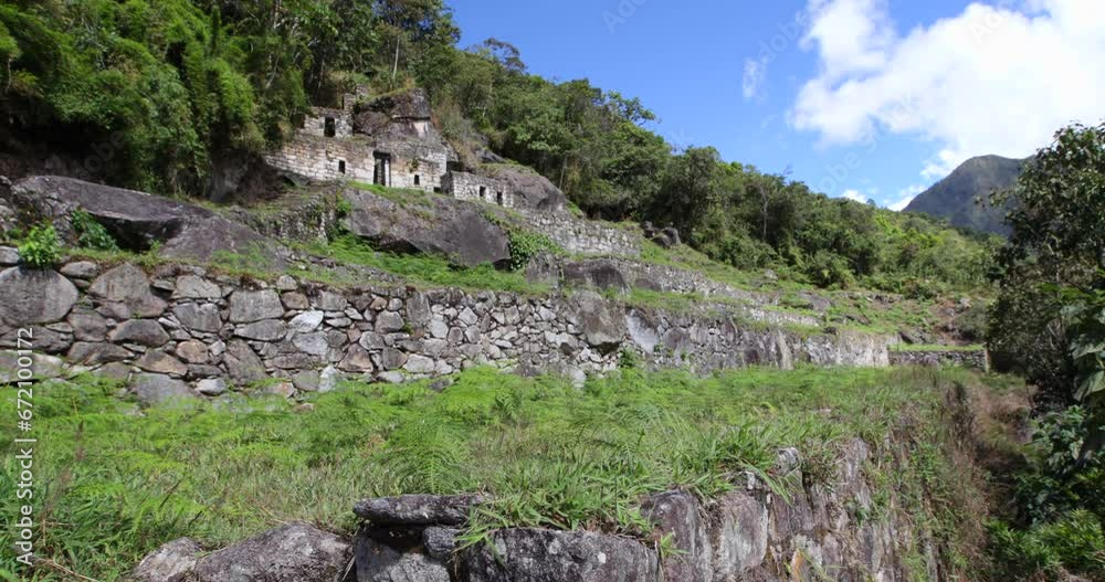 Beautiful Shot Of Ruins At Bottom of Hill - Machu Picchu, Peru Beautiful Shot Of Ruins At Bottom of Hill - Machu Picchu, Peru