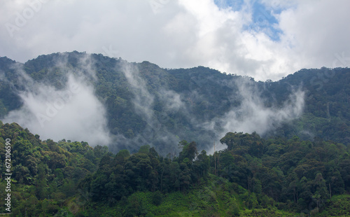 Scenic view of the misty mountains along the Genting Highlands, Malaysia photo